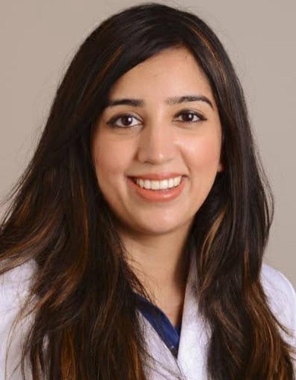 Dr.  Natasha  Hasan